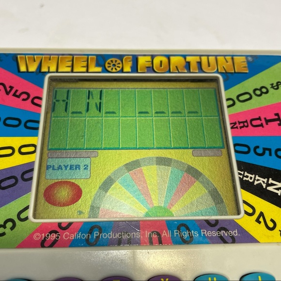 Tiger Wheel of Fortune Electronic Handheld game - Picture 7 of 10